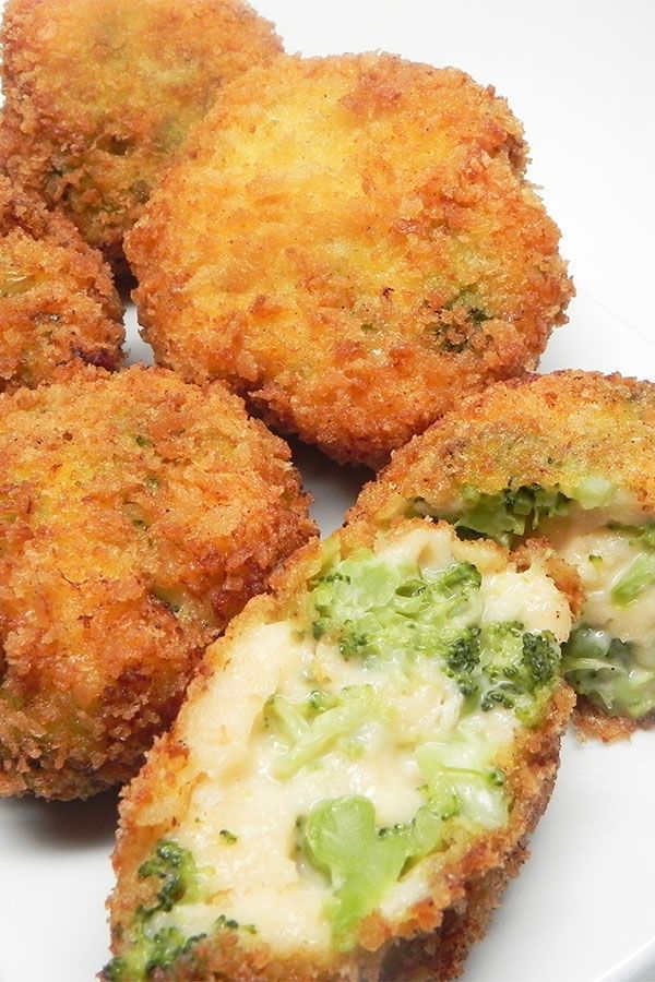 broccoli and cheese fritters on a white plate