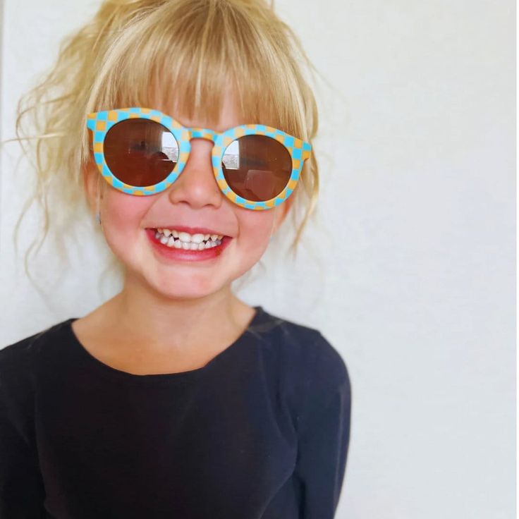 Introducing our vibrant and stylish Checked Blue + Orange Kids Sunglasses! Designed with utmost care, these sunglasses combine functionality and fashion to protect your child's eyes while adding a touch of delightful charm. Crafted with high-quality materials, these sunglasses ensure durability and provide excellent UV protection. Casual Sunglasses With Uv Protection For Playtime, Casual Sunglasses For Summer Playtime, Blue Summer Sunglasses For Vacation, Blue Sunglasses For Summer Vacation, Cute Sunglasses With Uva Protection For Vacation, Cute Sunglasses With Uv Protection For Vacation, Trendy Blue Sunglasses With Uva Protection, Blue Sunglasses For Spring Beach Season, Blue Sunglasses With Uva Protection For Vacation