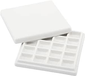 two white trays filled with different sized items