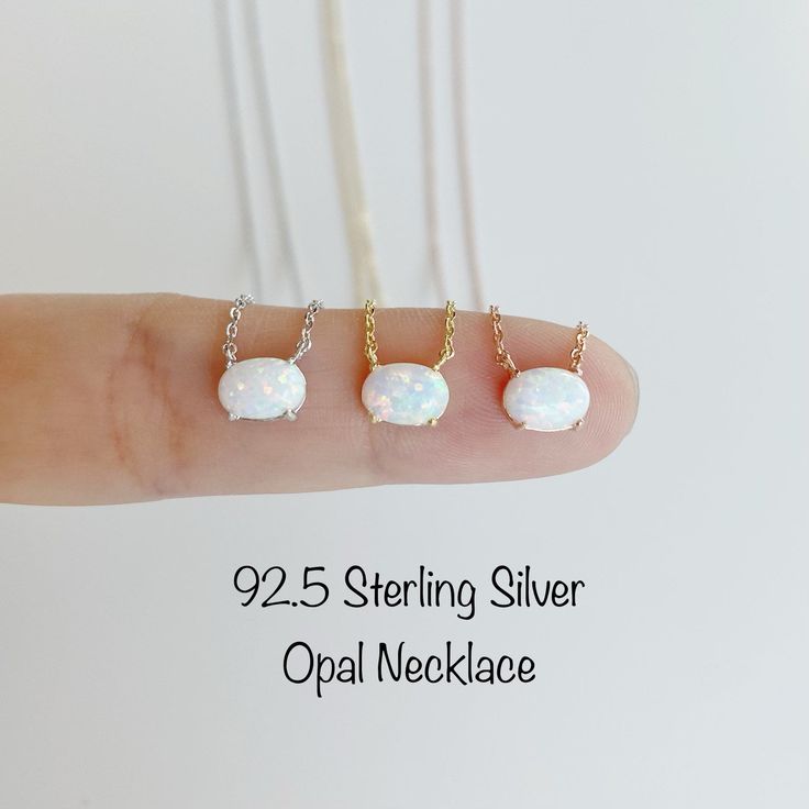 Tiny White Opal Stone Necklace Soft simple and adorable necklace is great for the gift: Mom, Wife, Grandma, Friends, Bridesmaids, and For You~ Stone Colors: White opal Nickel Free - Hypoallergenic Material: 92.5 Sterling Silver High Polish Gold, Rosegold and Rhodium Plated over Sterling Silver Chain Length: 17' + 2' extension Synthetic Opal Size: 7.5mm(W) * 5mm(H) Lobster Claw Clasp Ready for a Gift 🎁 RETURN POLICY : For any reason, if you are not satisfied with our product, you may return your Grandma Friends, Synthetic Opal, Opal Necklace, Brass Chain, White Opal, Pretty Jewellery, Sterling Silver Necklace, Stone Necklace, Sterling Silver Chains