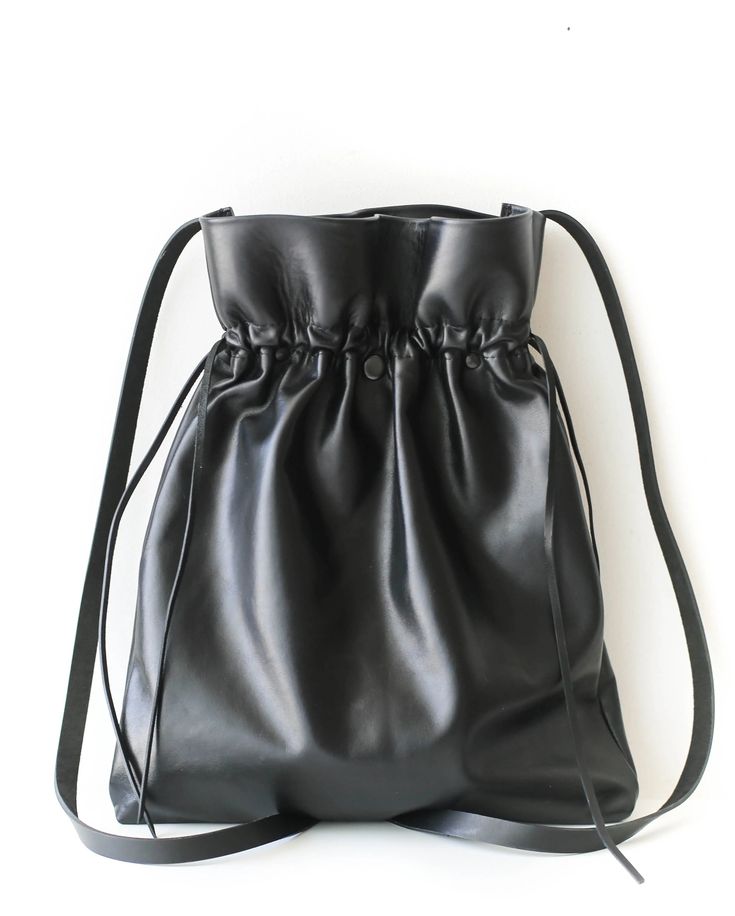 Designer Black Leather Drawstring Backpacks for women. Convertible Backpack - Leather Crossbody Bag, Handcrafted from the softest natural leather. Chic Leather Crossbody Backpack For Daily Use, Chic Soft Leather Backpack Satchel, Leather Large Capacity Backpack For Errands, Chic Soft Leather Crossbody Backpack, Soft Leather Crossbody Backpack, Chic Leather Backpack Shoulder Bag, Modern Soft Leather Crossbody Backpack, Leather Shoulder Bag Backpack For Daily Use, Leather Backpack Shoulder Bag For Daily Use