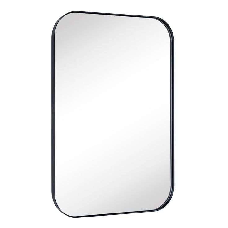 a mirror that is on the wall with a black frame and an empty white background