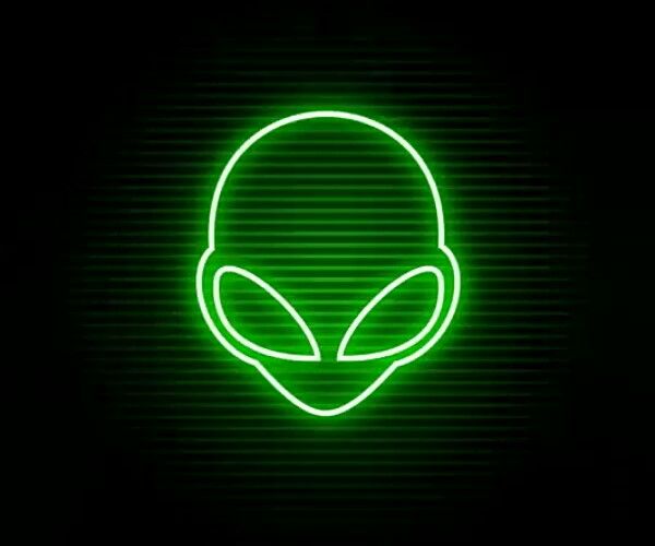 an alien head glowing in the dark with green neon lights on it's side