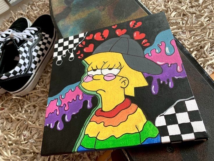 the simpsons painting is next to a pair of vans