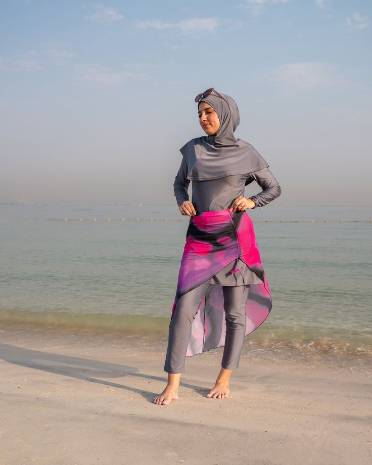 The UAE Purple Skirt Wrap is the perfect addition to your summer swimwear collection. Modest design Perfect for swimming Stylish and versatile Model is Size 12, 5'6 wearing our size M Durable Waterproof Sizes 4-16 The skirt wrap features a modest design that provides coverage while still allowing you to enjoy the sun and water. It's perfect for swimming, as it won't weigh you down or restrict your movement. The stylish design is versatile enough to wear with any swim top, making it a must-have f Beachwear Swim Skirt For Summer Water Sports, Summer Beachwear Swim Skirt For Water Sports, Beachwear Swim Skirt For Water Sports In Summer, Stretch Swim Skirt For Water Sports, Beachwear Style, Stretch Swim Skirt For Water Sports, Stretch Swim Skirt For Water Sports And Beachwear, Pink 4-way Stretch Beach Bottoms, Skirt Wrap, Womens Skirts