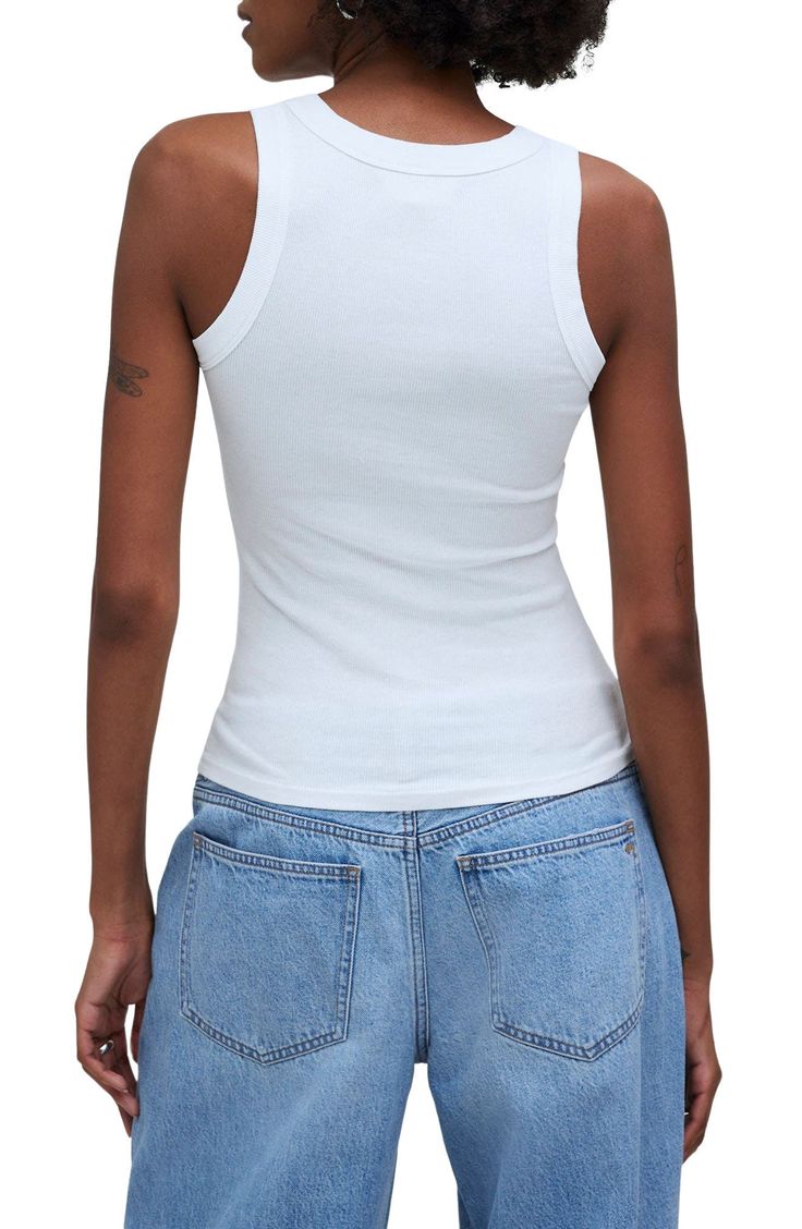 Slim, sexy and streamlined, the brand's best-selling tank is made from supersoft rib and has a high neckline and cutaway shoulders. 23 1/2" length (size Medium) Crewneck Cutaway shoulders 95% Supima® cotton, 5% elastane Machine wash, tumble dry Imported High Stretch Spring Camisole Tank Top, High Stretch Camisole Tank Top For Spring, Fitted Tank Top For Everyday, Summer Ribbed Fitted Tank Top, Fitted Knit Tank Top For Everyday, High Stretch Sleeveless Camisole For Spring, Fitted Cami Tank Top For Everyday Wear, Spring High Stretch Sleeveless Camisole, Everyday Fitted Ribbed Tank Top