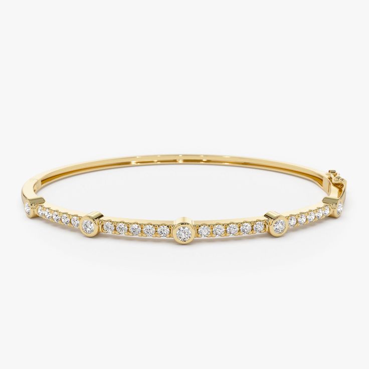 Elevate your wrist's elegance with our 14K Diamond Station Bangle, a stunning round diamond bracelet bangle featuring a gold hinge design. This diamond bangle bracelet exudes sophistication and charm, making it a beautiful accessory for women to adorn their wrists with timeless beauty and style. ▶Item Details * Made to Order * Gold KT: 14K Solid Gold (also available in 18K  upon request) * Custom Gold Color: Rose Gold, Yellow Gold, White Gold * Round Diamonds: 5pcs x 1.90MM * Round Diamonds: 20 pcs x 2.30MM * Total CTW: 0.76CTW * Diamond Color Clarity: G Color SI Clarity * Ready to Ship in 7-10 Business Days ▶ See more of our Diamond Bracelets - http://etsy.me/2mVrAB5 ▶ See our storefront here - http://etsy.me/2lUcVnH  ▶ All store sections here * Diamond Rings - http://etsy.me/2lwKUl8 * Di Luxury Round Bangle With Bezel Setting, Formal Round Cuff Bracelet With Single Cut Diamonds, Formal Cuff Bracelet With Single Cut Diamonds, Luxury Round Cuff Bracelet With Diamond Cut, Luxury Diamond Cut Round Cuff Bracelet, Luxury Round Diamond Cut Cuff Bracelet, Elegant Bangle Bracelet With Bezel Setting, Elegant Bezel Set Bangle Bracelet, Classic Hand Set Yellow Gold Bangle