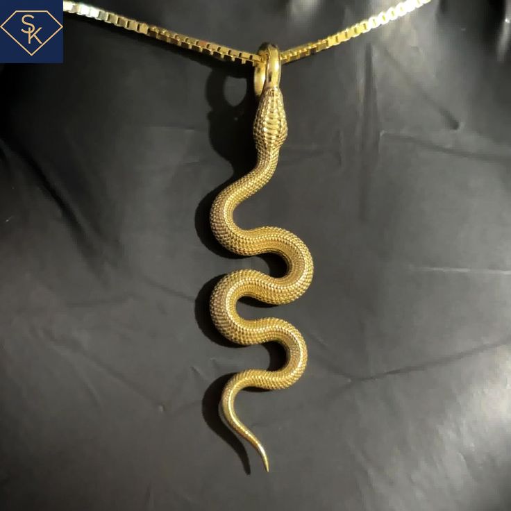 14K Solid Yellow Gold Snake Pendant _ Made In the USA Pendant Dimension: 39.6mm x 9.7mm Chain is not included with this order. Thank you for visiting my store. Please visit us on our website: www.SKCustomJewelry.com CUSTOMER IS SOLELY RESPONSIBLE FOR THE CUSTOM TAXES/IMPORT CHARGES, AND INTERNATIONAL SHIPPING, NO EXEMPTIONS. Petite Engagement Ring, Wooden Jewelery, Compass Pendant, Snake Pendant, Gold Snake, Lucky Star, Solid Yellow, Pendant Necklaces, Custom Jewelry