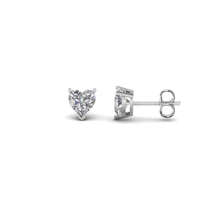 The pair of half carat stud earrings portrays two perfectly carved heart shaped diamonds of 0.50 carat total weight, H color, VS2 clarity in prong setting.Number of diamonds- 2.Direct manufacturing price.Professionals of medical field, lawyers, government employees, military men and university staffs can gain a discount of 5% at purchase of any jewelry. (Refer to discounted jewelry page)30 days easy return policy.Conflict free natural diamonds.Along with these lovely earring studs, own an endearing diamond religious pendant fused with panache. 1 Carat Diamond Earrings, Push Gifts, Carved Heart, Heart Shaped Earrings, Heart Shaped Diamond, Lovely Earrings, Best Diamond, Heart Studs, Heart Earrings Studs