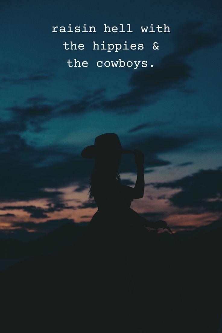 the silhouette of a woman wearing a cowboy hat