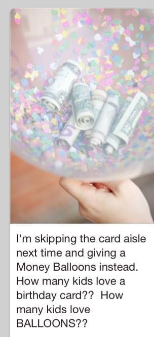 a person holding a bubble filled with money and confetti on top of it