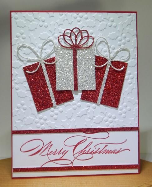 a red and white christmas card with presents