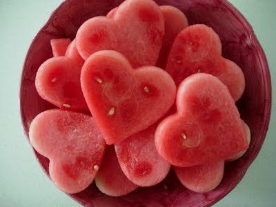 watermelon hearts in a bowl on a table