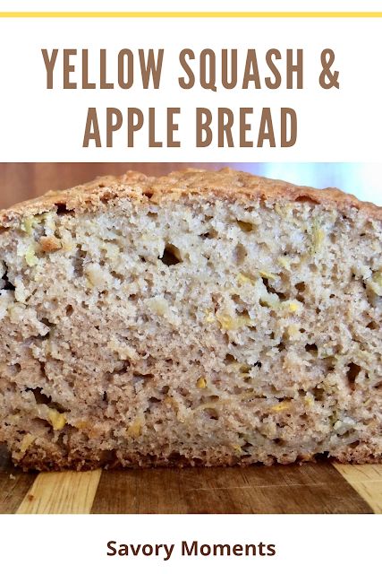 a loaf of yellow squash and apple bread sitting on top of a wooden cutting board