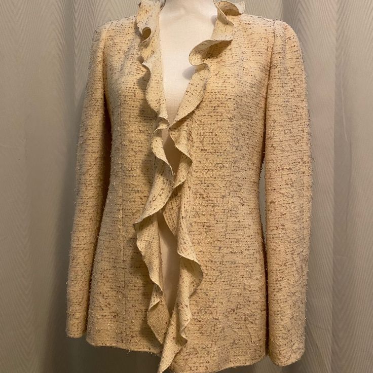 Beautiful Cream Chanel Jacket. Very Elegant! Designer Cream Outerwear For Fall, Elegant Cream Outerwear For Fall, Designer Beige Long Sleeve Outerwear, Elegant Cream Tweed Jacket For Winter, Designer Tailored Tweed Jacket For Spring, Designer Cream Blazer For Spring, Luxury Long Sleeve Tweed Jacket For Spring, Spring Formal Outerwear With Ruffles, Designer Long Sleeve Tweed Jacket For Spring