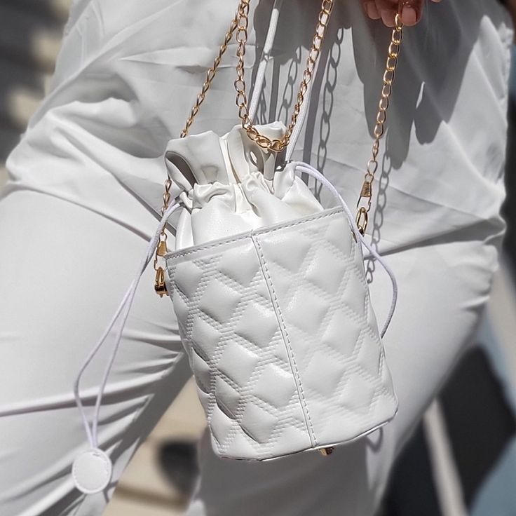 White Quilted Hand Bag With Detachable Gold Chain, Drawstring Closure, And Gold Feet Details. Size: 10" X 6" Approx. Brand: Unknown Price: $20 #Style #Fashion #Purse #Channices_chicboutique Chic White Rectangular Pouch, White Pouch Box Bag For Shopping, Elegant White Bucket Bag With Mobile Phone Holder, Elegant White Bucket Bag With Phone Holder, White Summer Bucket Bag With Dust Bag, Chic White Shoulder Bag Pouch, Chic White Shoulder Pouch, White Shoulder Bag With Mobile Phone Pocket For Errands, Chic White Bucket Box Bag