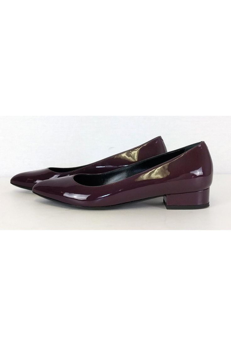 Made in a rich plum color and with a trendy pointed toe, these heeled flats are bound to become a favorite. They can be worn day or night, to work or for after-hours. The possibilities are endless! Size 7.5 - EU 37.5 Patent leather upper Leather lining & sole Made in Italy Pointed toe Slip on Small heel Light marks on leather Some wear on outsole Heel height 1" Low Heel Ballet Flats For Evening In Fall, Fall Evening Ballet Flats With Low Heel, Evening Pointed Toe Flats With Low Heel, Pointed Toe Flats With Low Heel For Evening, Medium Width Pointed Toe Flats For Office, Party Pointed Almond Toe Flats For Fall, Fall Party Pointed Almond Toe Flats, Formal Fall Ballet Flats With Almond Toe, Formal Almond Toe Ballet Flats For Fall