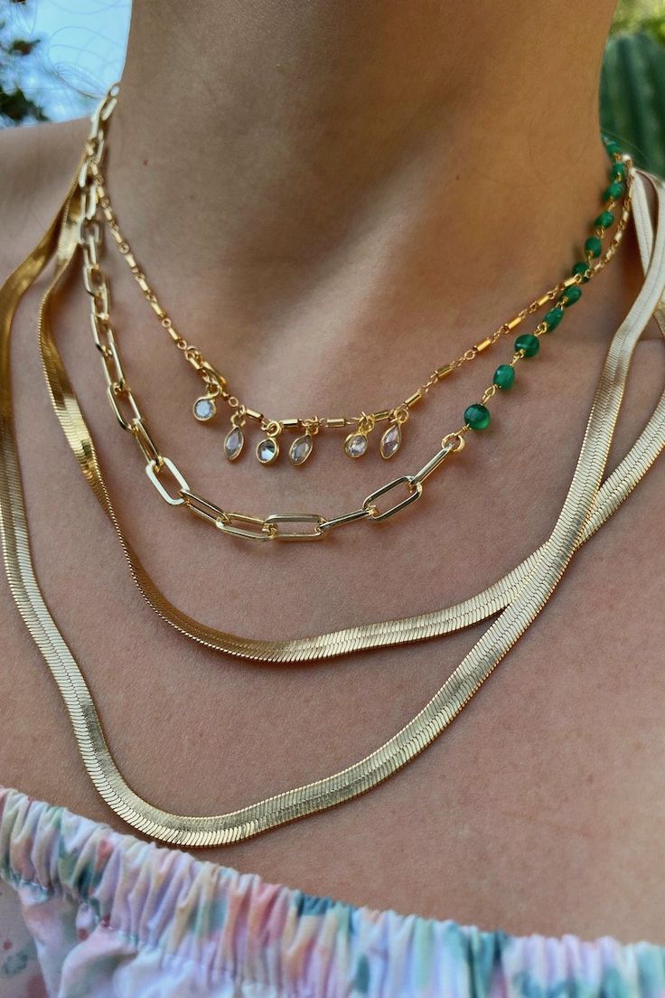 A luxe 14K gold fill paperclip chain and mixed green onyx gemstone necklace measuring 18." Made from stainless steel with 14K gold plate and a clear coating making it non tarnishable, thoughtfully made and high quality. Worn beautiful on own as an everyday piece or as luxe layering piece with your other NG pieces. Shown worn layered with the Stella + Relic necklaces. Quality made jewelry. Water resistant and beach safe jewelry. Beach Safe, Green Onyx Necklace, Onyx Gemstone, Natural Gifts, Green Onyx, Green Necklace, Gems Jewelry, Gemstone Healing, Gemstone Necklace