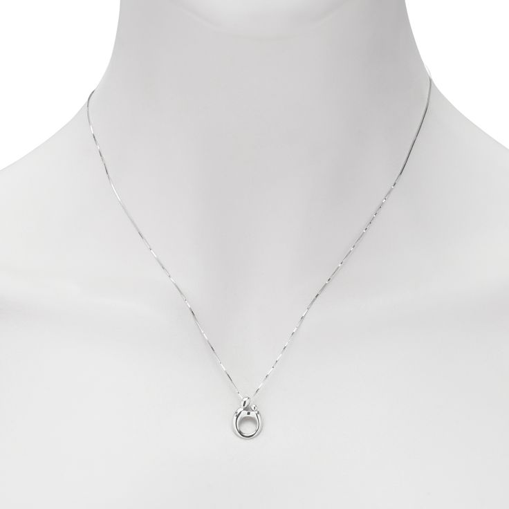 Embrace the unique bond between mother and child with this beautiful pendant. It features mother and child joining hands while celebrating the shining beauty of a mother's love. Perfect for Mothers Day, mom's birthday or for a new Mom.- Pendant is constructed of fine quality 14 karat white gold for a lifetime of wear- Pendant measures .54" long x .37" wide- Free cleaning and inspection at Day's for the life of this pendant