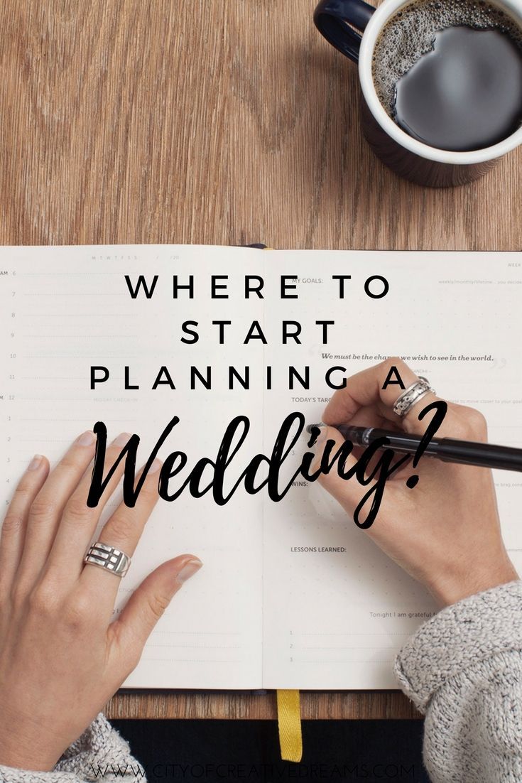 a person writing on a piece of paper with the words where to start planning a wedding?