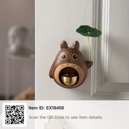 a brown bear head mounted to the side of a door with a plant growing out of it