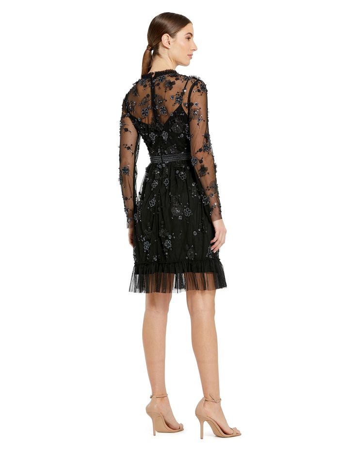 This exquisite dress features delicate sheer long sleeves that add a touch of allure, while intricate embellishments create a captivating sparkle. The flattering midi length makes it perfect for cocktail parties, formal events, or special occasions. Mac Duggal Embellished Mesh Overlay; 100% polyester lining Fully-lined bodice, sheer sleeves High neckline Long sleeve Floral embellishments with beaded detailing Ruffled/detailed hem Approx. 40" from top of shoulder to bottom hem Available in Black Long Sleeve Dressy Dresses For Gala, Formal Long Sleeve Embellished Midi Dress, Long Sleeve Evening Dress With Sheer Sleeves, Elegant Long Sleeve Dress For Spring Party, Party Evening Dress With Illusion Neckline And Long Sleeves, Long Sleeve Evening Midi Dress For Wedding, Long Sleeve Dresses For Fall Gala, Long Sleeve Midi Dress For Evening Wedding, Luxury Long Sleeve Midi Dress For Wedding