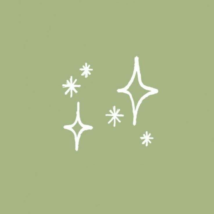 three snowflakes are flying in the air on a green background with white outline