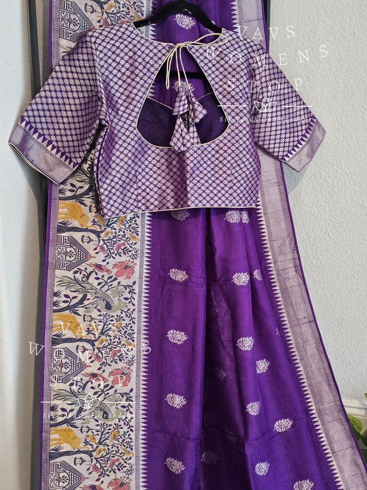 Blouse stitched - YesBlouse Opening - FrontPadded - noBlouse size - 36 with inner margins expandable upto 42For Blouse Size 34 alteration can be done on request. Fall/pico - Yes done. Purple Cutdana Blouse For Festivals, Festival Purple Blouse With Cutdana, Traditional Blouse With Back Yoke, Traditional Drape Blouse With Block Print For Festivals, Traditional Drape Block Print Blouse For Festivals, Traditional Padded Purple Blouse, Handloom Long Sleeve Blouse For Navratri, Long Sleeve Handloom Blouse For Navratri, Traditional Blouse For Festivals With Back Yoke