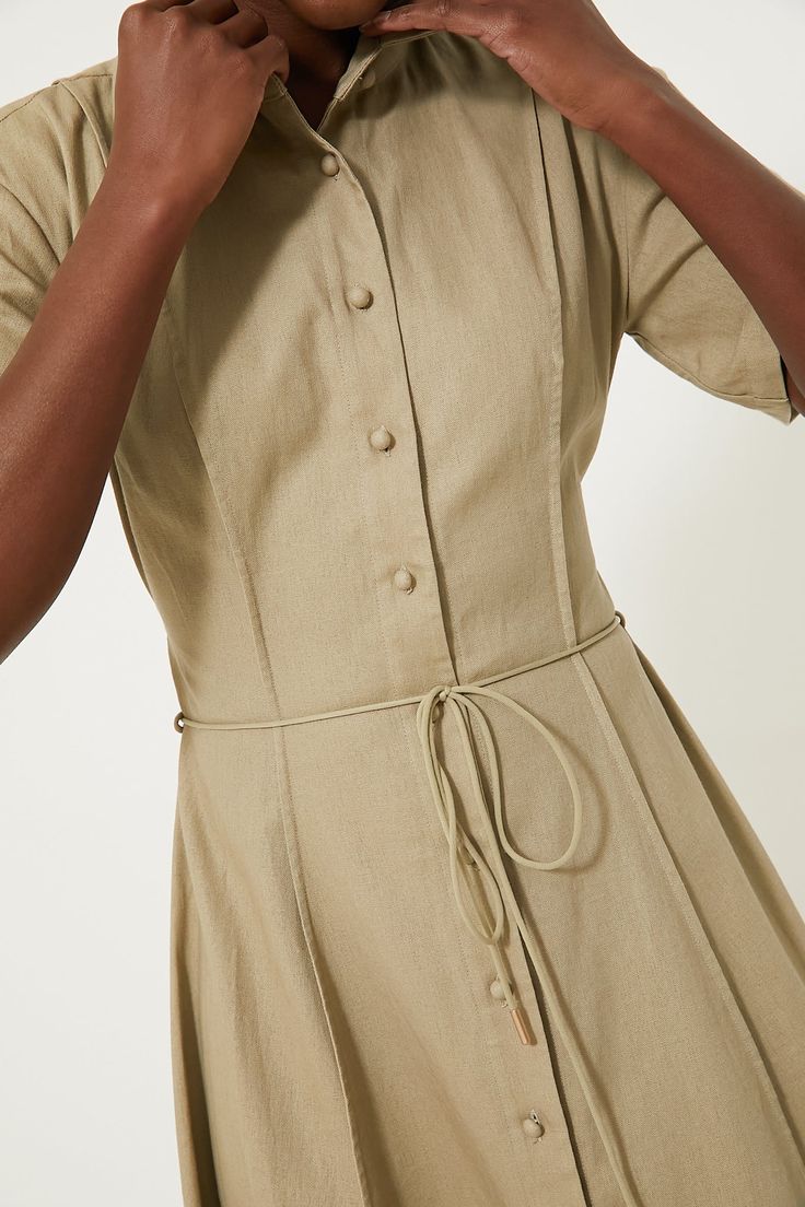 Founded in 2021 by designer Natasha Gordon, CLEA is a Melbourne-based premium womenswear label with a focus on timeless silhouettes and considered materials.Wow the crowd in the Pale Olive Green Annalise Shirt Dress. This sophisticated maxi is beautifully crafted in a linen-cotton blend with bespoke embroidery and a front button placket. The neutral light green makes this a perfect option for year-round wear, simply pair with heels or ballet flats and you are ready to go! Collar Short sleeves Pi Timeless Silhouettes, Plus And Minus, Pattern Ideas, Pin Tucks, Covered Buttons, Button Placket, Ballet Flats, Light Green, Dresses For Sale