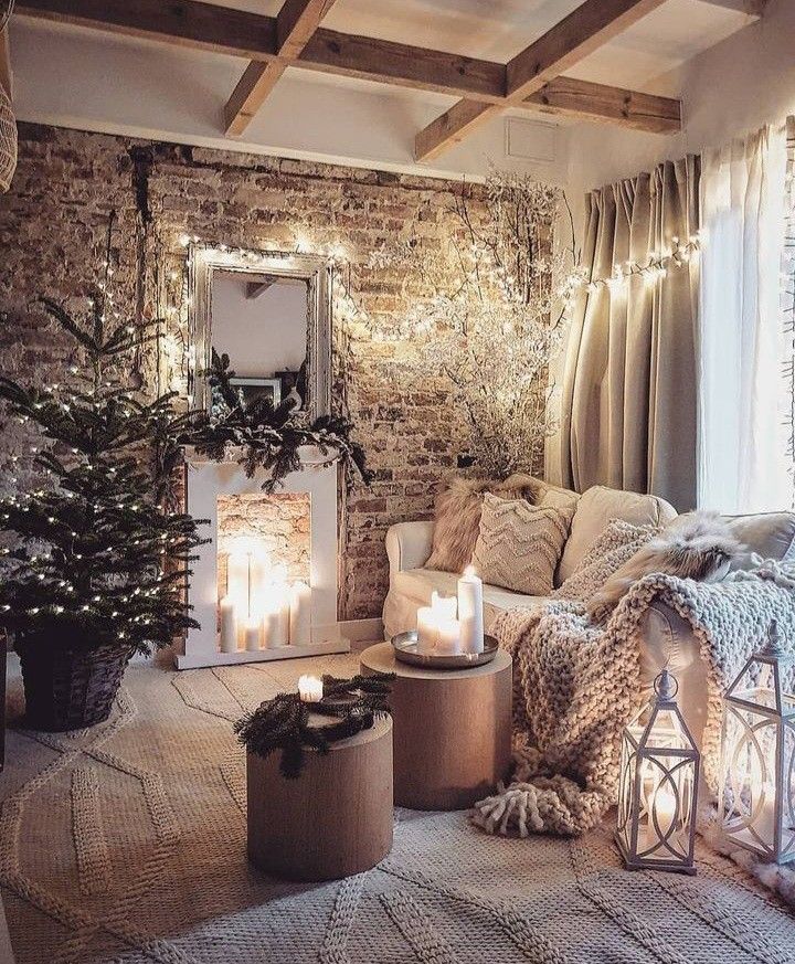 a living room filled with furniture next to a fire place and a christmas tree in the corner