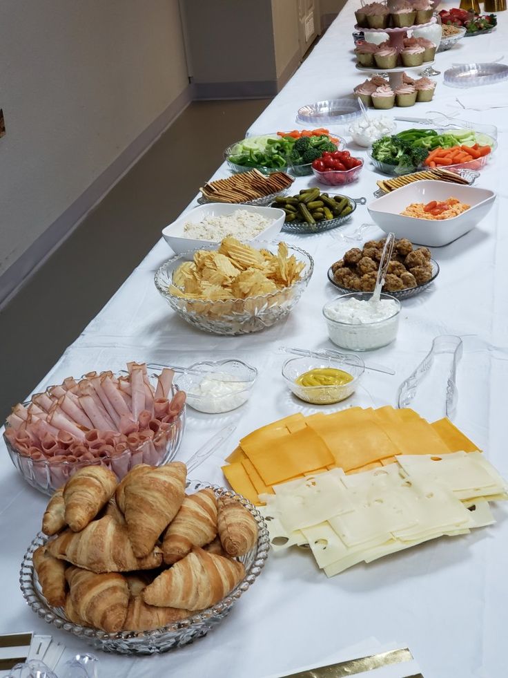 a long table with many different types of food on it