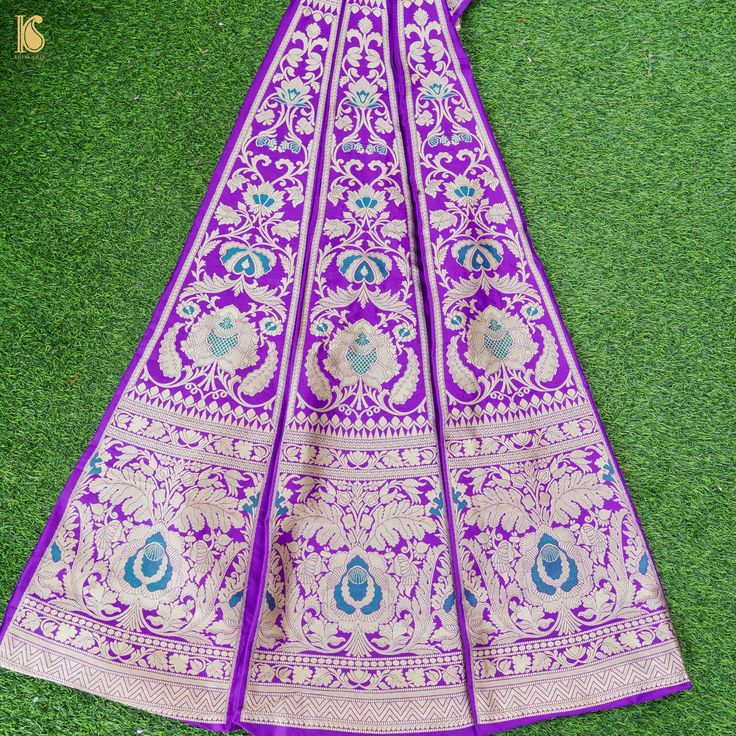 Make your special occasion even more memorable with our exquisite collection of Kalidar Banarasi lehengas. Crafted with pure silk and intricate handwoven designs, these lehengas are sure to turn heads and leave a lasting impression. Perfect for weddings, receptions, and other festive celebrations, a Kalidar Banarasi lehenga is a must-have in every woman's wardrobe. Traditional Lehenga In Dola Silk With Traditional Patterns, Jamawar Lehenga For Diwali Reception, Jamawar Dupatta For Reception And Festivals, Diwali Reception Jamawar Lehenga, Festive Dola Silk Lehenga With Traditional Patterns, Traditional Drape Lehenga With Patterns In Dola Silk, Dola Silk Lehenga With Traditional Patterns, Jamawar Lehenga With Pallu For Reception, Paithani Silk Lehenga For Traditional Ceremonies And Festivals