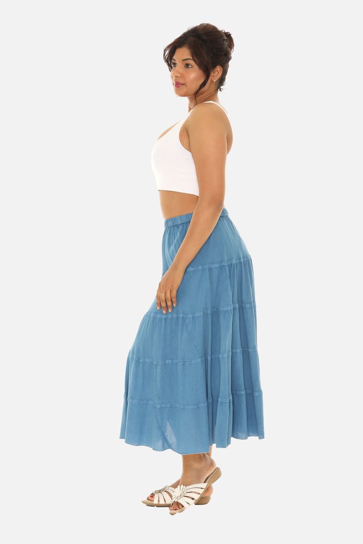 Give your warm-weather wardrobe a refresh with this midi skirt featuring a ruffled tiered design. Elastic Waist High Waist, -Long Maxi & Flared Skirt, Tone-On-Tone Embroidery Boho Print, Lightweight Woven Construction Unlined, Casual,Vacation,Beach Summer Tiered Ruffle Maxi Skirt, Beach Tiered Ruffle Maxi Skirt, Tiered Ruffled Maxi Skirt For Beach, Beach Tiered Maxi Skirt With Ruffled Details, Flowy Tiered Beach Bottoms, Flowy Tiered Bottoms For Beach, Flowy Long Skirt With Layered Hem, Beach Tiered Ruffled Maxi Skirt, Bohemian Tiered Flowy Skirt