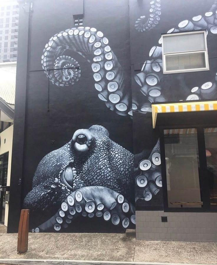 an octopus mural on the side of a building