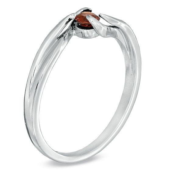 A fiery-hued round garnet is embraced within fine sterling silver for a look trend-worthy as well as timeless. Symbolizing faith, truth and friendship, the 3.4mm garnet is January's birthstone, making this ring a truly unforgettable birthday surprise. Custom made to fit her ring size, sterling silver rings can not be resized after purchase. Garnet Birthstone Ring In Fine Jewelry Style, Birthstone Ring With Polished Finish For Gift, Polished Finish Birthstone Ring As Gift, Polished Finish Birthstone Ring With Round Stone, Gift Birthstone Ring With Polished Round Stone, Garnet Ruby Ring For Promise, Formal Sterling Silver Stackable Rings With Birthstone, Promise Birthstone Ring With Tension Setting In Sterling Silver, Ruby Birthstone Ring For Promise