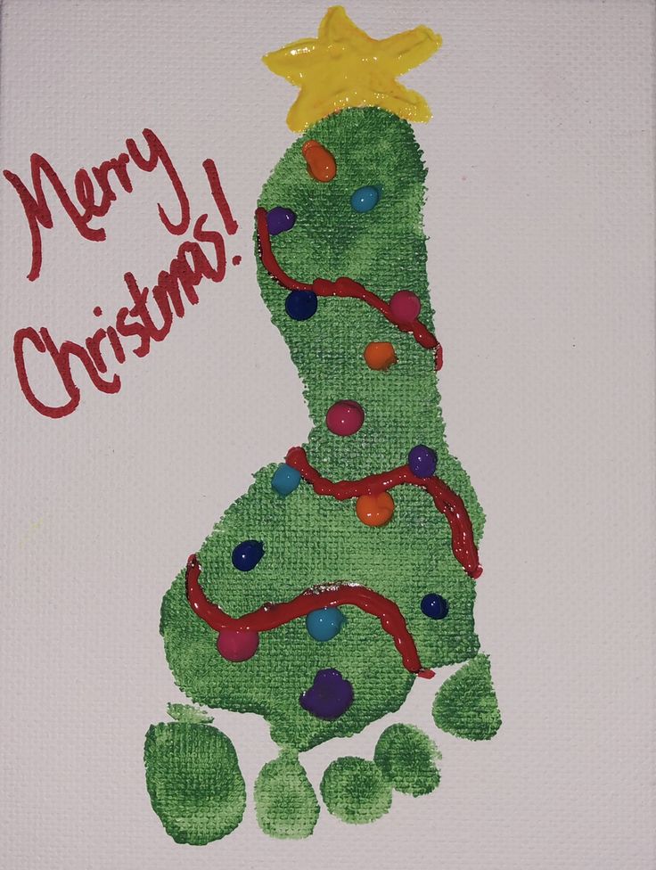 a handmade christmas card with the shape of a green tree on it's side