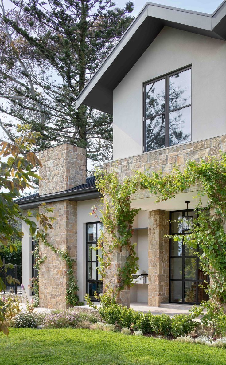 a house that has some plants growing on it