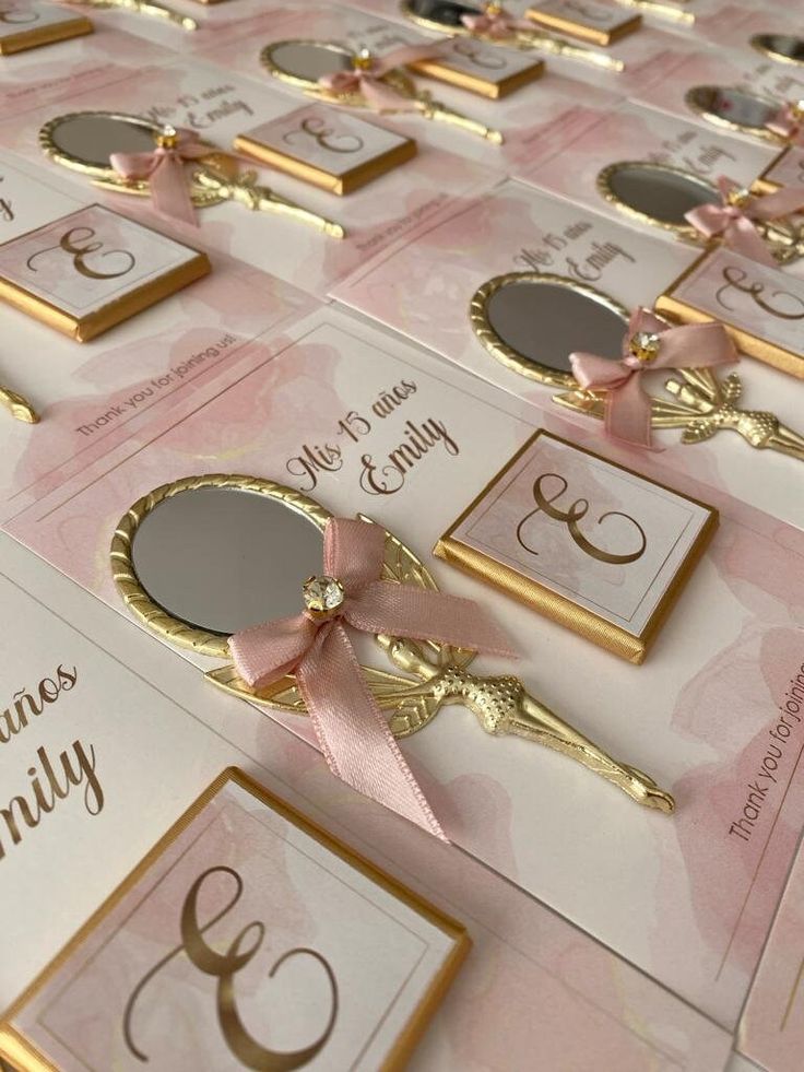 pink and gold wedding place cards on display