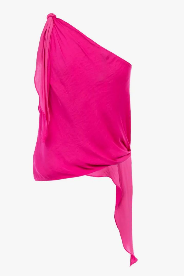 Slip into this vibrant hot pink one shoulder asymetrical top to transition from day to night! Constructed from soft, flowing fabric, this style features adjustable ties at the shoulder and waist. 100% Polyester Runs true to size. Chic Pink One-shoulder Top, Pink Asymmetrical Summer Top, Pink Asymmetrical Top For Summer, Chic Pink One-shoulder Top For Spring, Chic Draped One Shoulder Top For Summer, Pink Asymmetrical Party Top, Pink Asymmetrical Top For Party, Pink Tops With Asymmetrical Neckline, Pink One-shoulder Top For Night Out