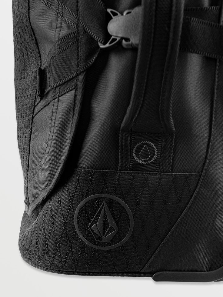 a black backpack with an embossed logo on the front and side pockets that are zippered together