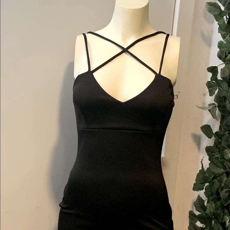 Black Sexy Dress Size M Spaghetti Double Cris Cross Straps New With Tags Strappy Stretch Bodycon Dress For Night Out, Strappy Bodycon Dress For Night Out, Black Fitted Strappy Mini Dress, Black Mini Dress With Strappy Back For Party, Black Cami Mini Dress For Night Out, Black Mini Dress With Straps For Night Out, Black Stretch Mini Dress With Crisscross Straps, Strappy Stretch Mini Dress For Night Out, Black Strappy Mini Dress For Night Out