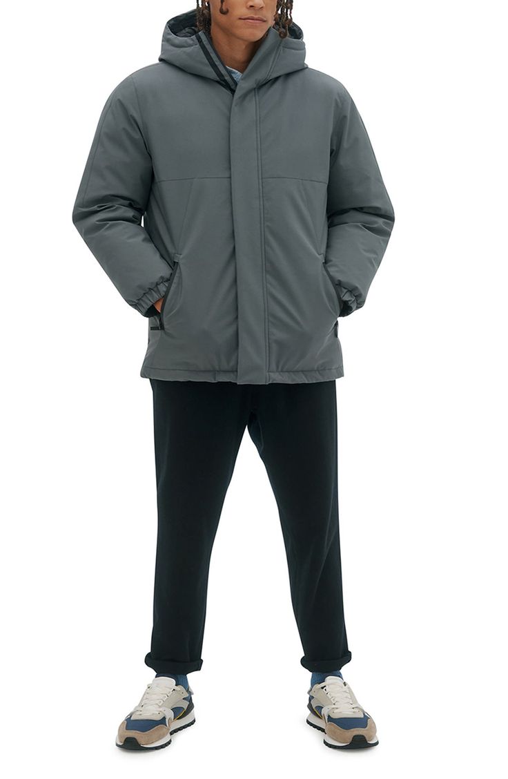 A warm insulated coat that is fitted with a hood and zipper pockets, with a shell that will shield you from conditions up to -15°C/5°F. 32" Length (size M) Attached hood Long sleeves Zipper front Dual zipper pockets Solid Woven Fully lined Shell: 100% polyester; lining: 100% synthetic filling Machine wash, line dry Imported Model stats: 6'1" height, 32" waist. Model is wearing size M. Weatherproof Long-sleeve Down Parka, Gray Puffer Jacket With Pockets For Cold Weather, Cold Weather Down Hooded Jacket With Double-lined Hood, Weatherproof Hooded Down Outerwear, Hooded Down Parka, Waterproof Down Outerwear, Gray Hooded Puffer Jacket With Detachable Hood, Gray Hooded Weatherproof Outerwear, Gray Weatherproof Hooded Outerwear