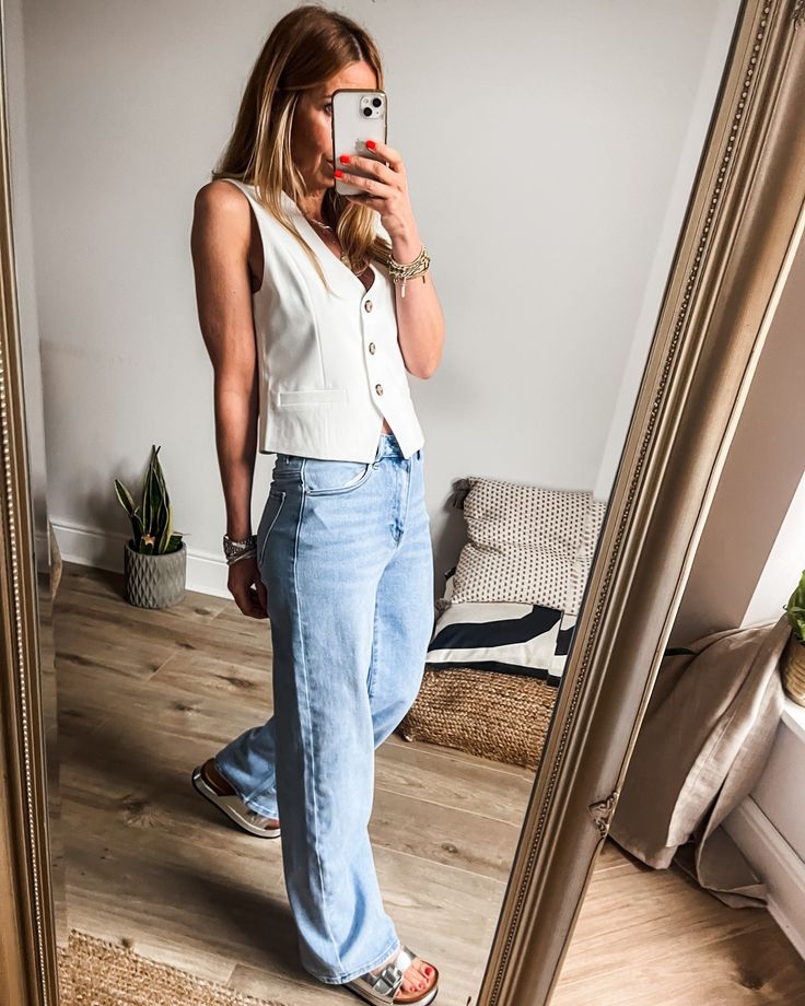 High low dressing 101: take this tailored-to-perfection waistcoat, add a pair of relaxed-fit wide-leg jeans and finish the look with metallic flatform sides. Now you're ready for ANY occasion! . . . #outfitoftheday #minimalstyle #springfashion #mumstyle #fashionover30 #fashionover40 #manchesterfashion #stylist #ukstyle #waistcoat #widelegjeans #summeroutfit #howtostyle #waistcoatoutfit Waistcoat And Jeans Outfit, Waistcoat With Jeans, Waistcoat And Jeans, Wide Jeans Outfit, Waistcoat Outfit, Mum Fashion, Summer Jeans, Wide Jeans, Shoe Fits