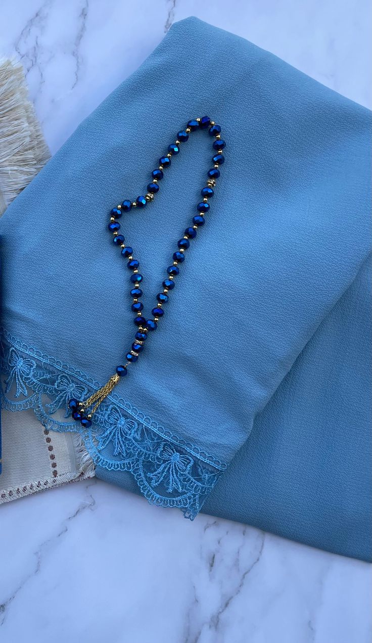 Dark blue Islamic tasbih/masbaha hand strung at 36.5cm, The full count masbaha consists of 33 beads divided into sections of 17 by the marker beads.This makes the perfect gift along with our rainbow qurans. Tasbih Aesthetic, Blue Quran, Islam Aesthetic, Blue Abaya, Blue Drawings, Personal Aesthetic, Muslimah Aesthetic, Gray Aesthetic, Islamic Gifts