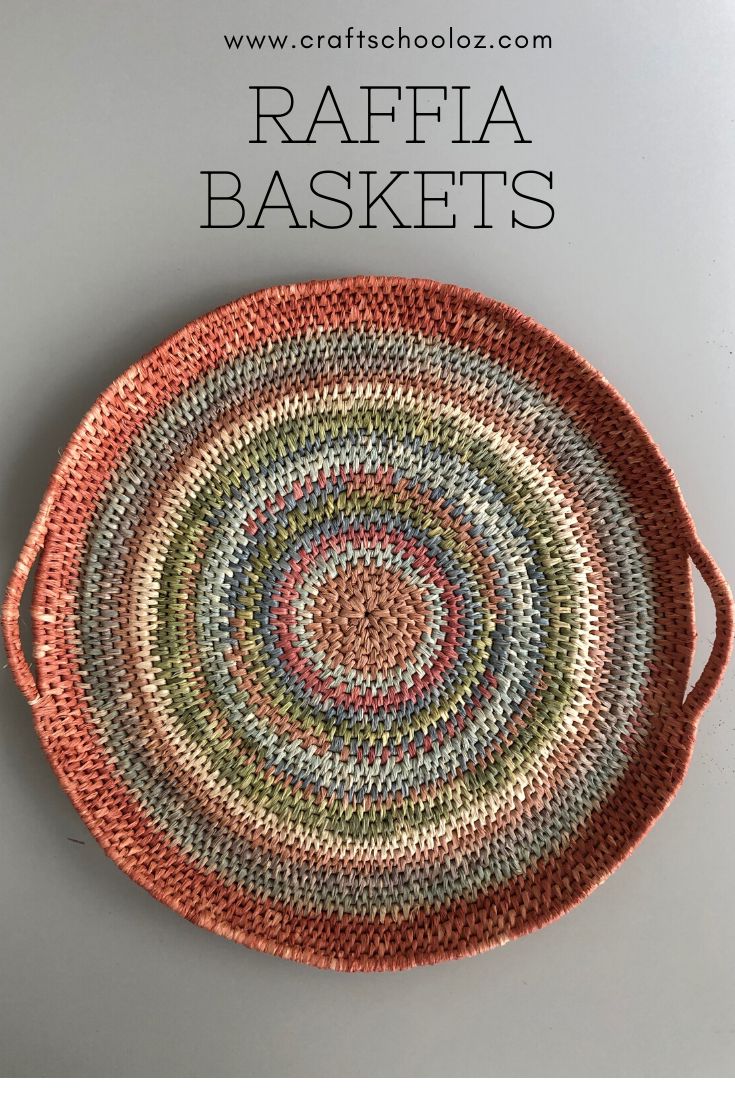 a crocheted basket is shown with the words raffia baskets written on it