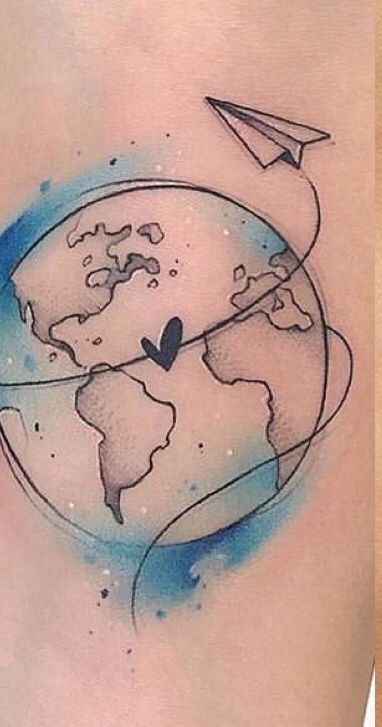 a woman's stomach with an airplane flying around the world tattoo on her back