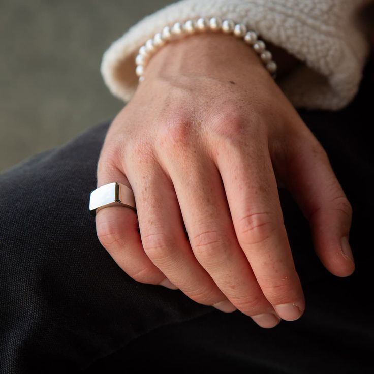 ANGULAR SIGNET RING IN SILVER PLATED STAINLESS STEEL Water/sweat/heat resistant (no green skin) Comes in eco-friendly packaging Weight approx 9g We make this ring following our sustainable ethos. It's crafted from recycled stainless steel, and it can be fully recycled again to make new products in the future. White Sterling Silver Signet Ring Minimalist Style, Minimalist White Sterling Silver Signet Ring, Timeless White Rectangular Jewelry, Minimalist Adjustable White Gold Signet Ring, Adjustable White Gold Signet Ring For Everyday, Adjustable Minimalist White Gold Signet Ring, Timeless White Signet Ring For Gift, White Minimalist Jewelry With Polished Finish, Minimalist White Jewelry With Polished Finish