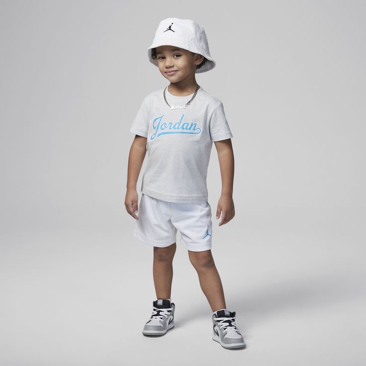 Smaller ballers can represent the Brand of Flight in this matching 2-piece set. The soft jersey knit graphic tee has a regular fit and feels gentle on skin and the matching breathable mesh shorts have a stretch waistband for a comfy fit kiddos can play freely in. Sporty White T-shirt For Playwear, Moisture-wicking Short Summer Tops, Sportswear Tops For Playwear, Cotton Athleisure T-shirt For Playwear, Short Sleeve Sportswear Tops For Play, Cotton Sportswear Shorts For Playwear, Casual Moisture-wicking Short Top, Casual Cotton Activewear For Playwear, Summer Athleisure T-shirt For Playwear