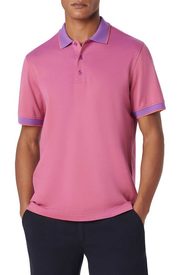 Mercerized cotton brings softness and polish to a polo crafted from a breathable piqué knit and framed in bright tipping at the collar and sleeves. 28" length Button half-placket Short sleeves 100% cotton Machine wash, dry flat Imported Classic Pink Top With Ribbed Collar, Classic Fitted Pink Polo Shirt, Sporty Pink Collared Polo Shirt, Pink Fitted Polo Shirt For Spring, Fitted Pink Polo Shirt For Spring, Fitted Pink Sporty Polo Shirt, Fitted Purple Polo Shirt With Polo Collar, Classic Pink Collared Polo Shirt, Classic Pink Polo Shirt