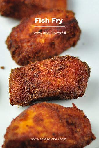 fried fish fry on a white plate with the words fish fry written above it in red